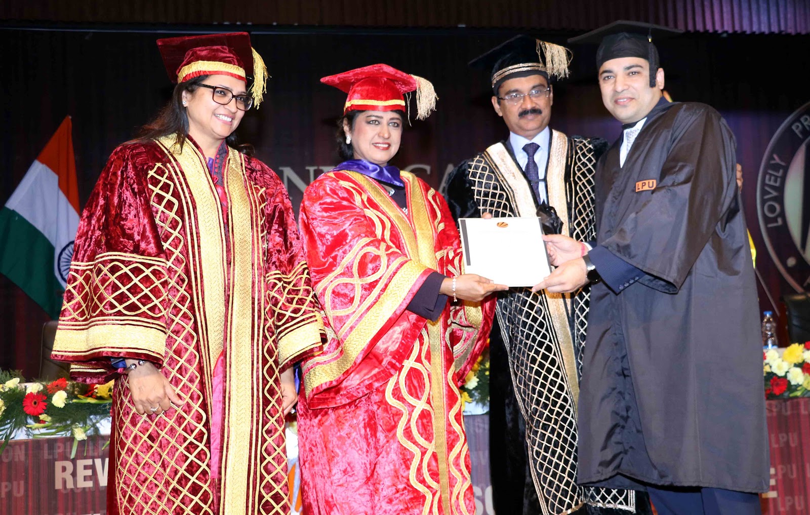 HE President of the Republic of Mauritius Dr Ameenah Gurib Fakim, LPU Chancellor Ashok Mittal, Pro Chancellor Rashmi Mittal giving PhD degree to student Rajiv Sobti at LPU Convocation.JPG