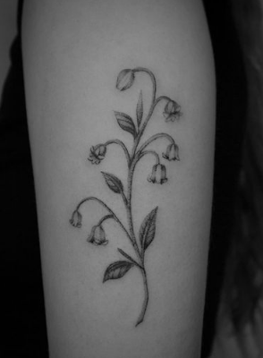 Creative Lily Of The Valley Tattoo