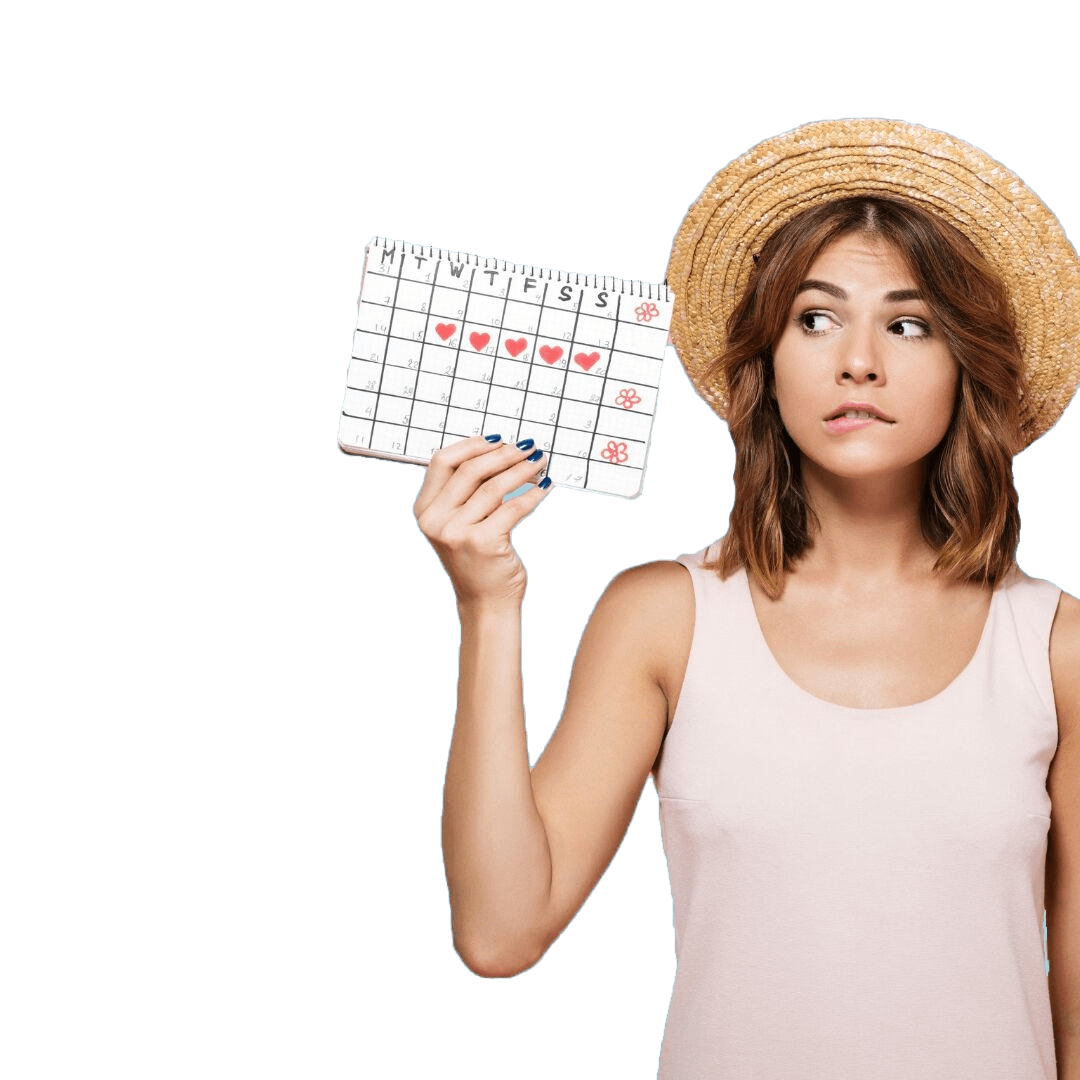 woman wearing a hat with her calendar in her hands