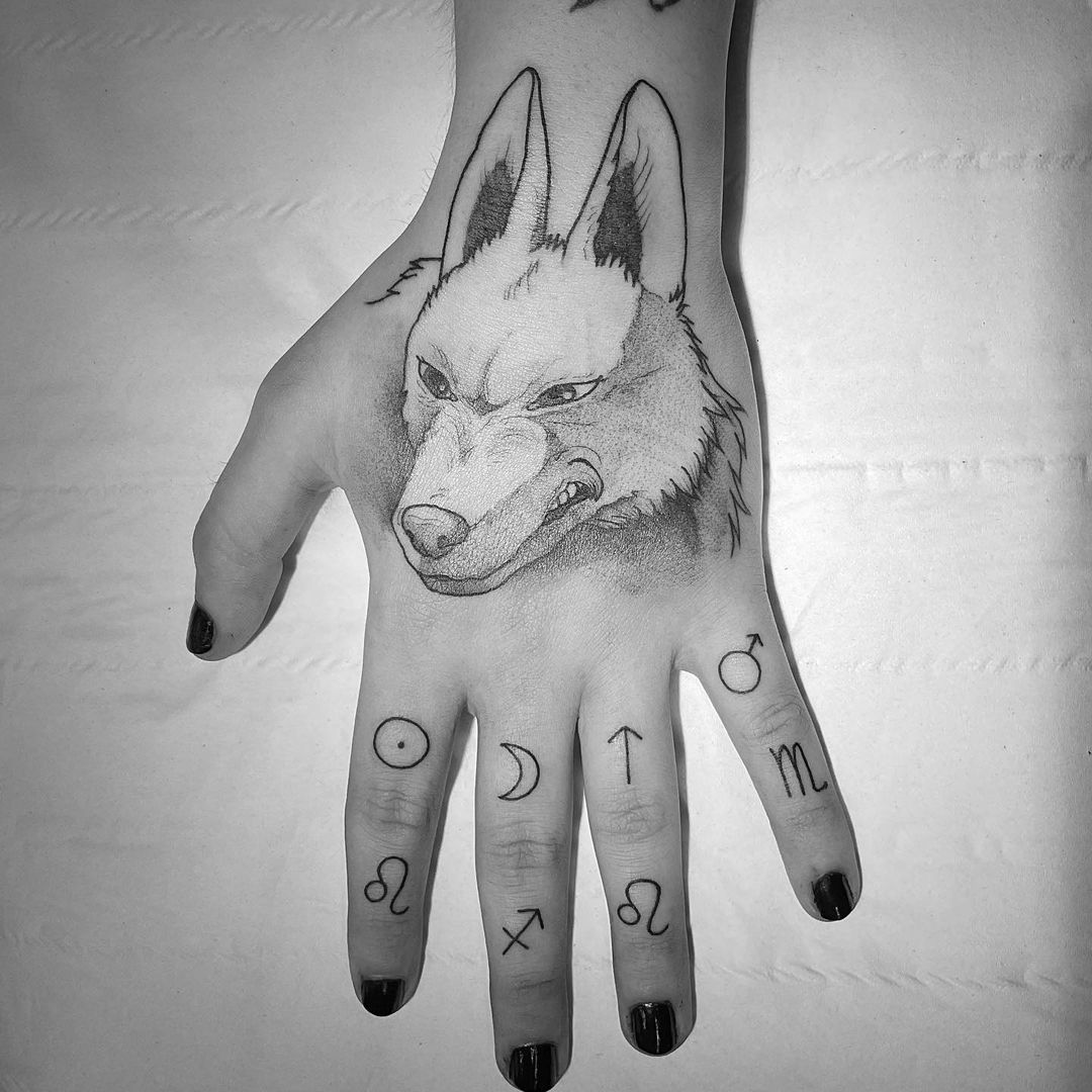 Arrow and Wolf Tattoo