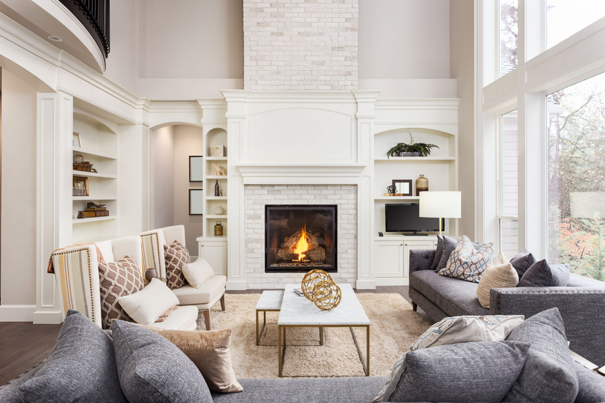 A living room with a fireplace.