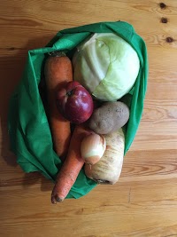 Bundle bags are a mix of root veggies and apples.