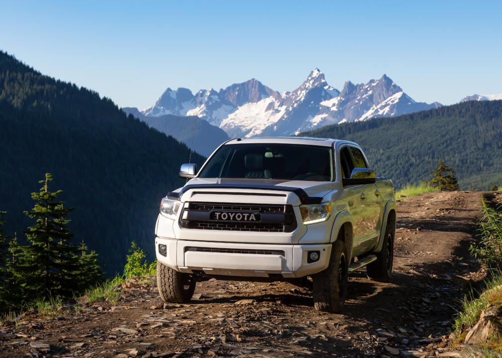 Toyota Tacoma riding on mountain trails on a sunny morning