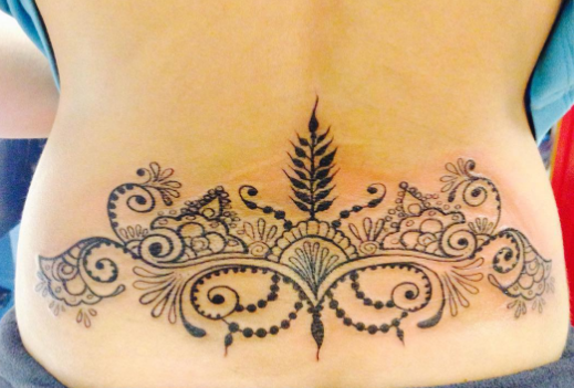 Ornamental Lower Back Tattoo