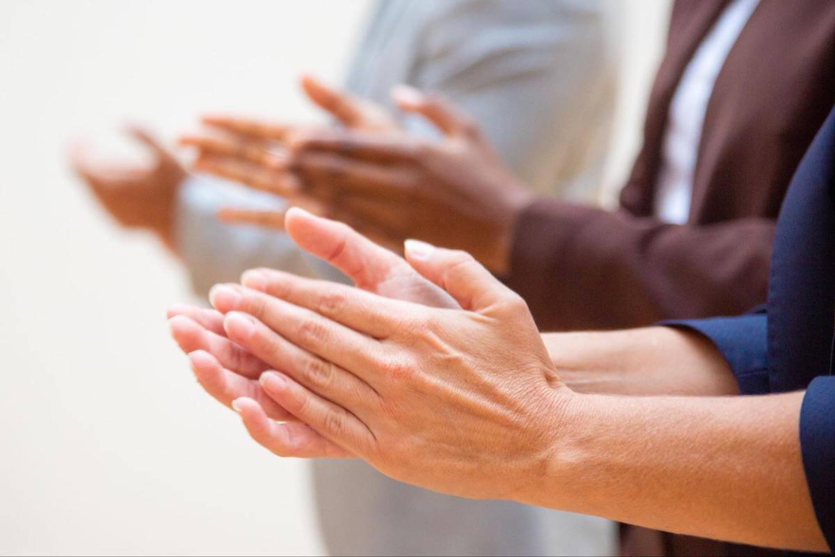 Closeup of hands applauding