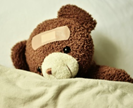 Teddy mit Pflaster