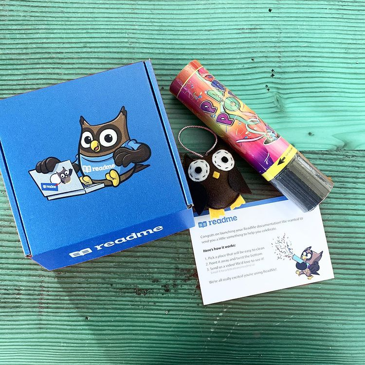 Blue packaging box designed with little brown owl encouraging you to read. Photo by Arka