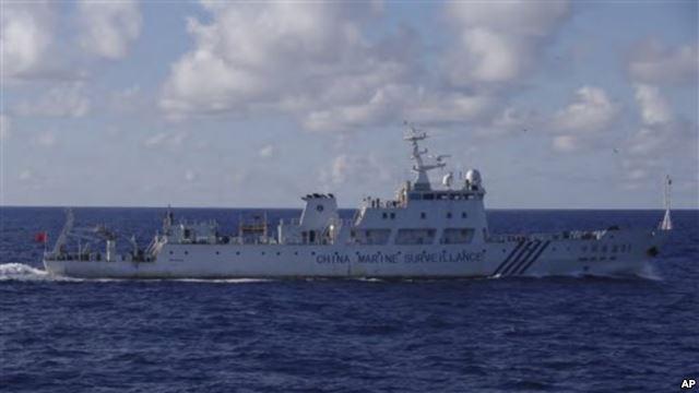 本海上保安厅公布的照片显示中国海监-51号2012年9月14日晨在离争议岛屿大约24公里的水域巡弋。