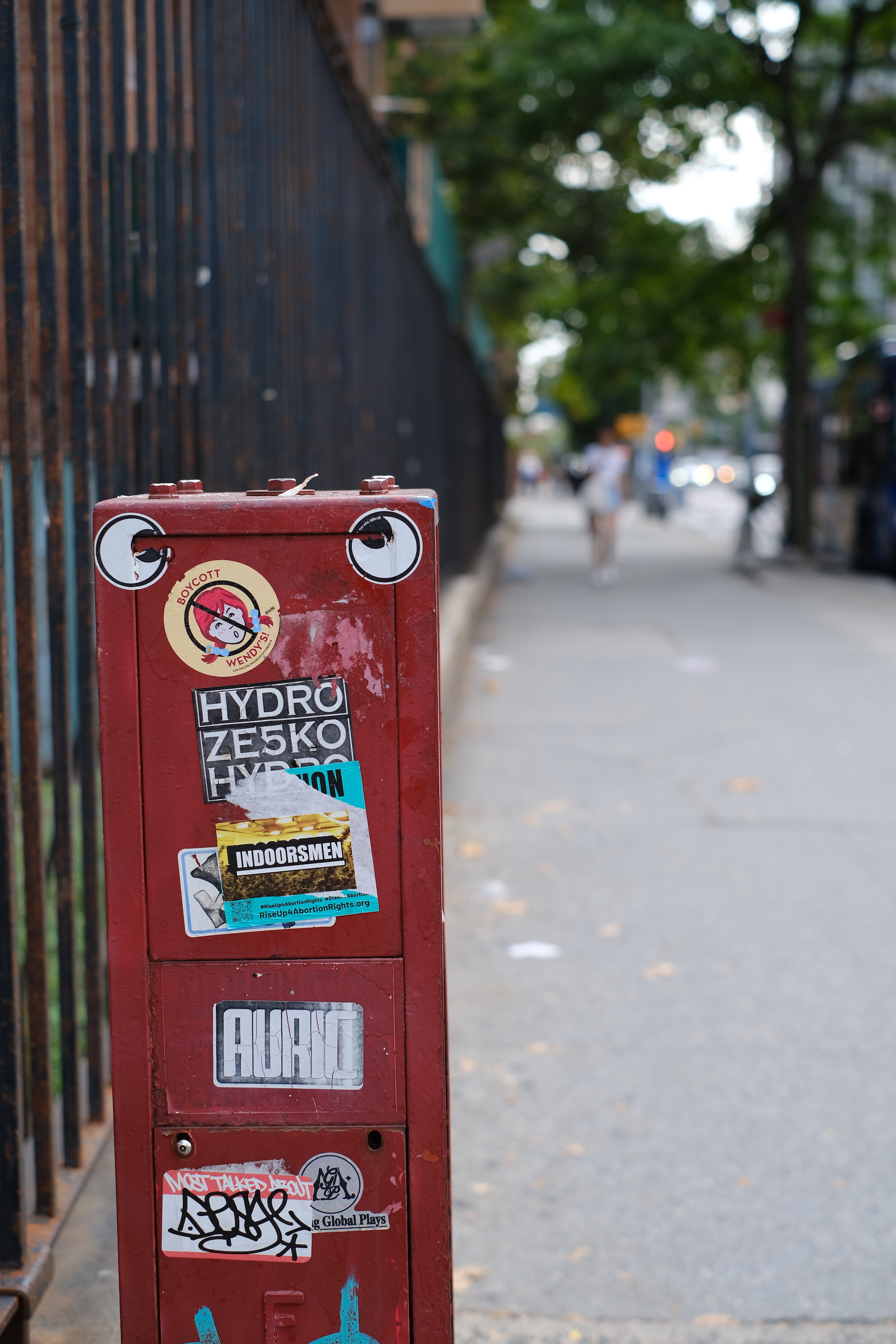 A electricity box with stickers