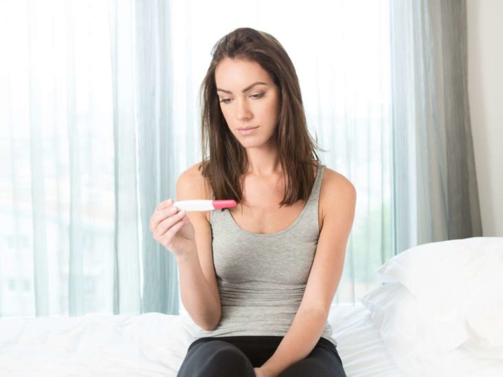 women checking if she's pregnant or not
