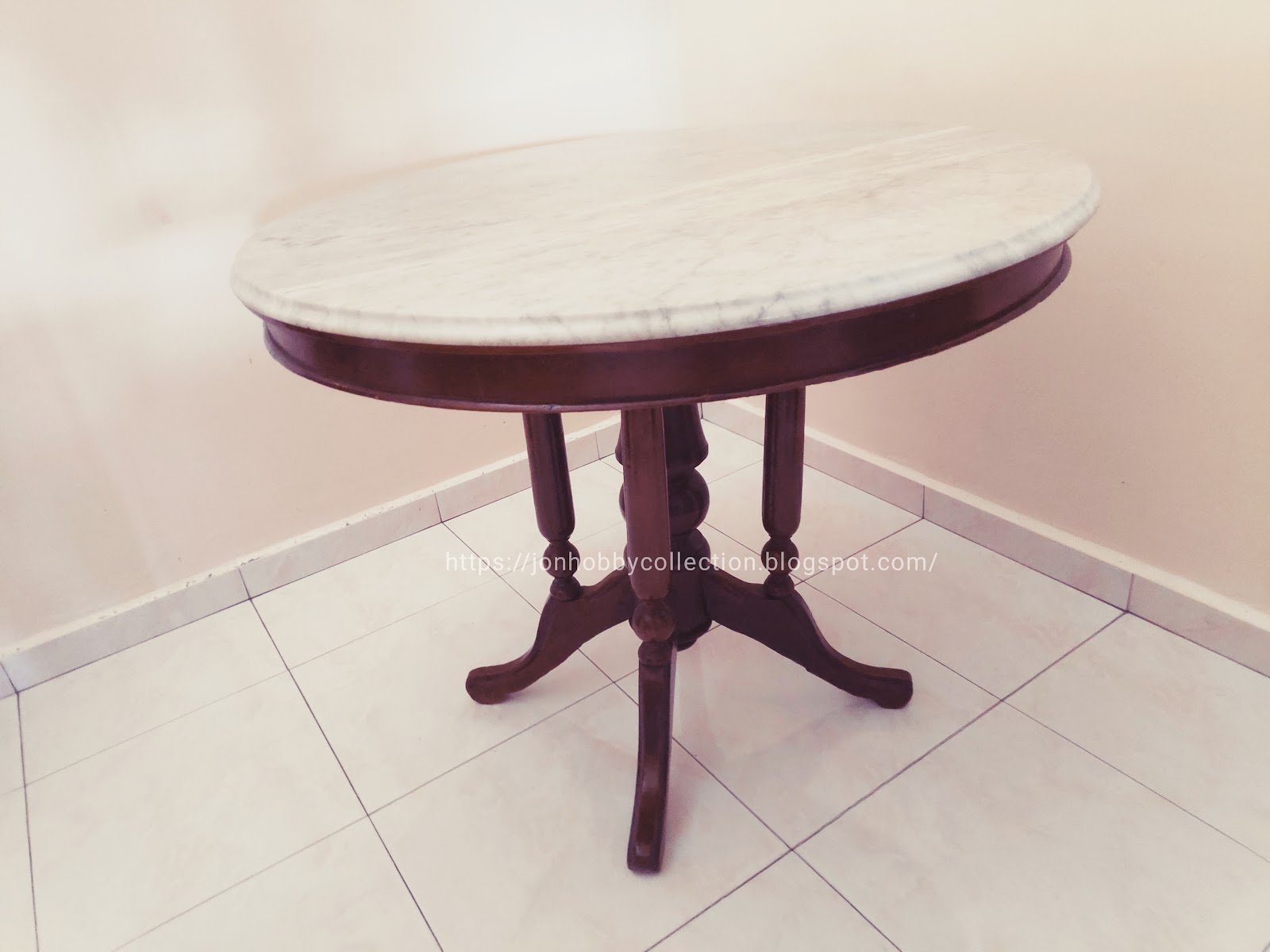 Here is an old vintage Kopitam Table from the 50s