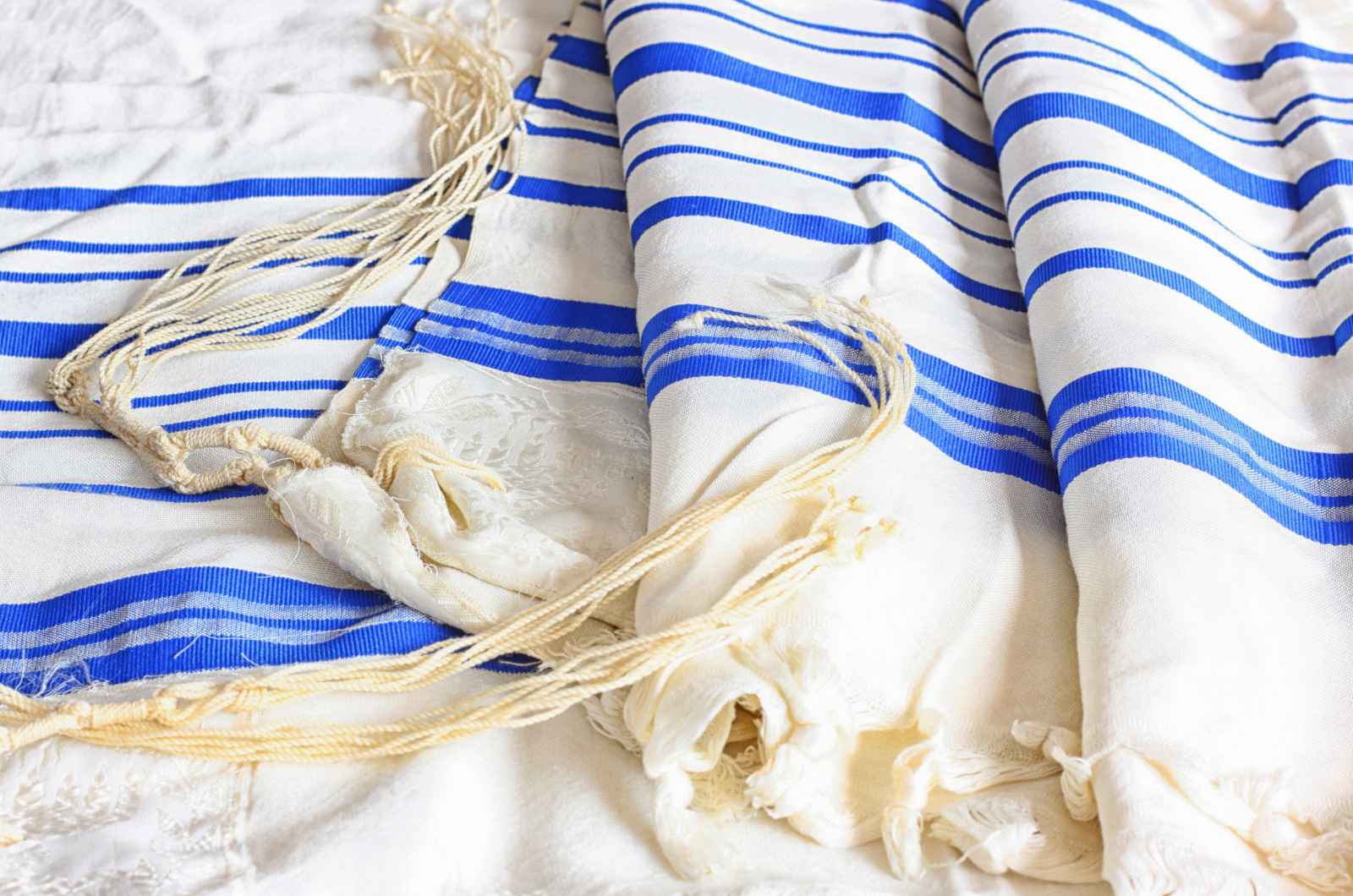 The tallit with tzitzit on the corners comes from the traditional