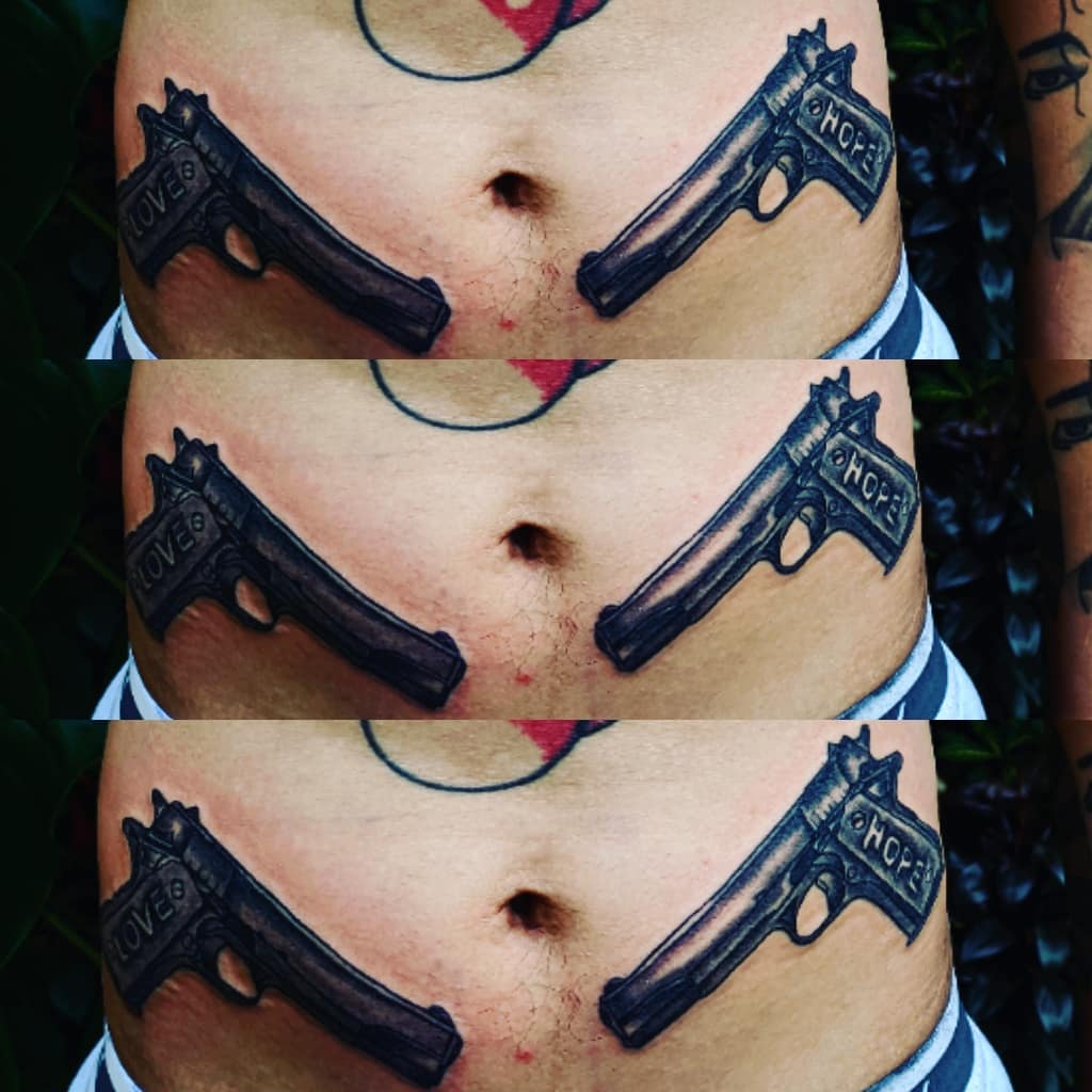 Hope and Love Gun Tattoo On Waist