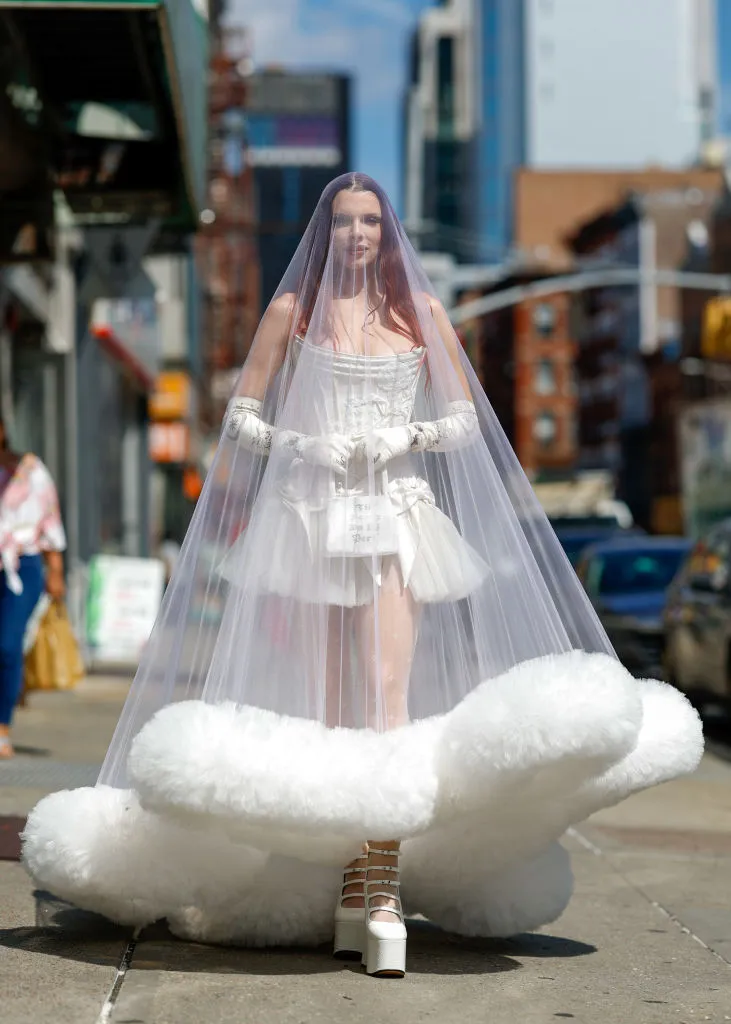 Julia Fox wears a  bridal dress for the New York Fashion Week 2023