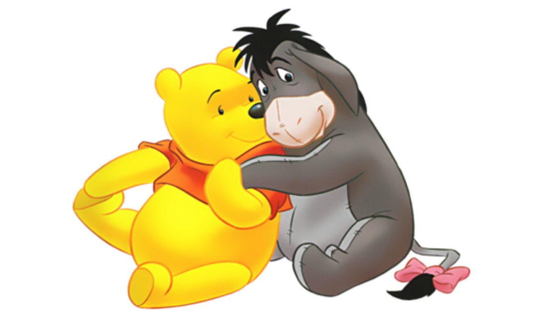 Winnie the Pooh and Eeyore hugging each other.