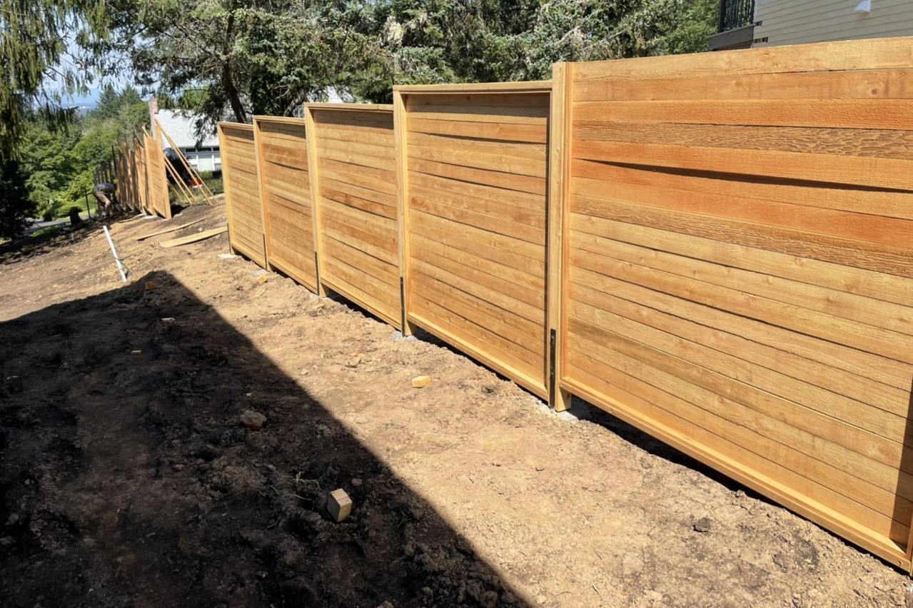 wooden fence for a home construction