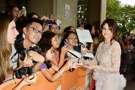 Image result for selena gomez with fans