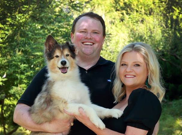 Fort Worth, TX realtor Adrianne Holland with her husband and their rescue dog