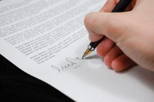  Person signing document. 