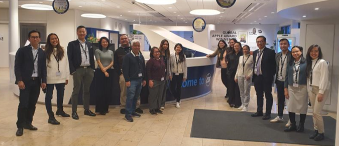 A group of people posing for a photoDescription automatically generated