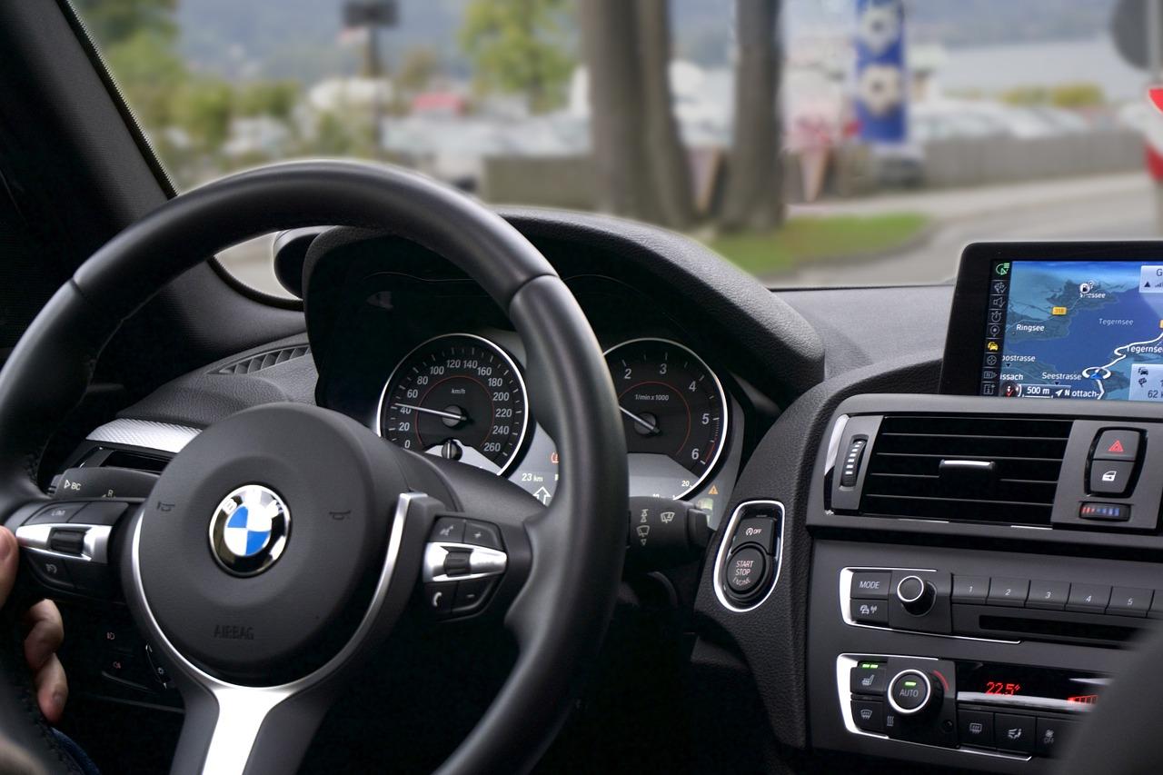 A picture of the interior of a BMW with an exotic vehicle protection plan from Veritas Global Protection driving