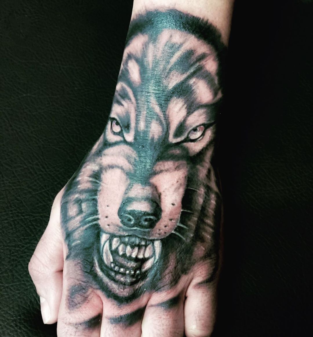 Stylish Wolf Hand Tattoos For Men