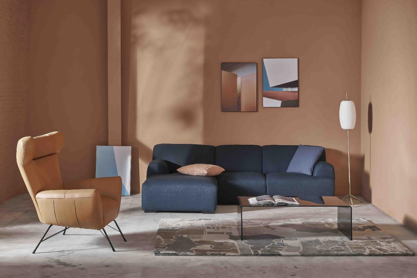 A living room with a blue couch

Description automatically generated with medium confidence