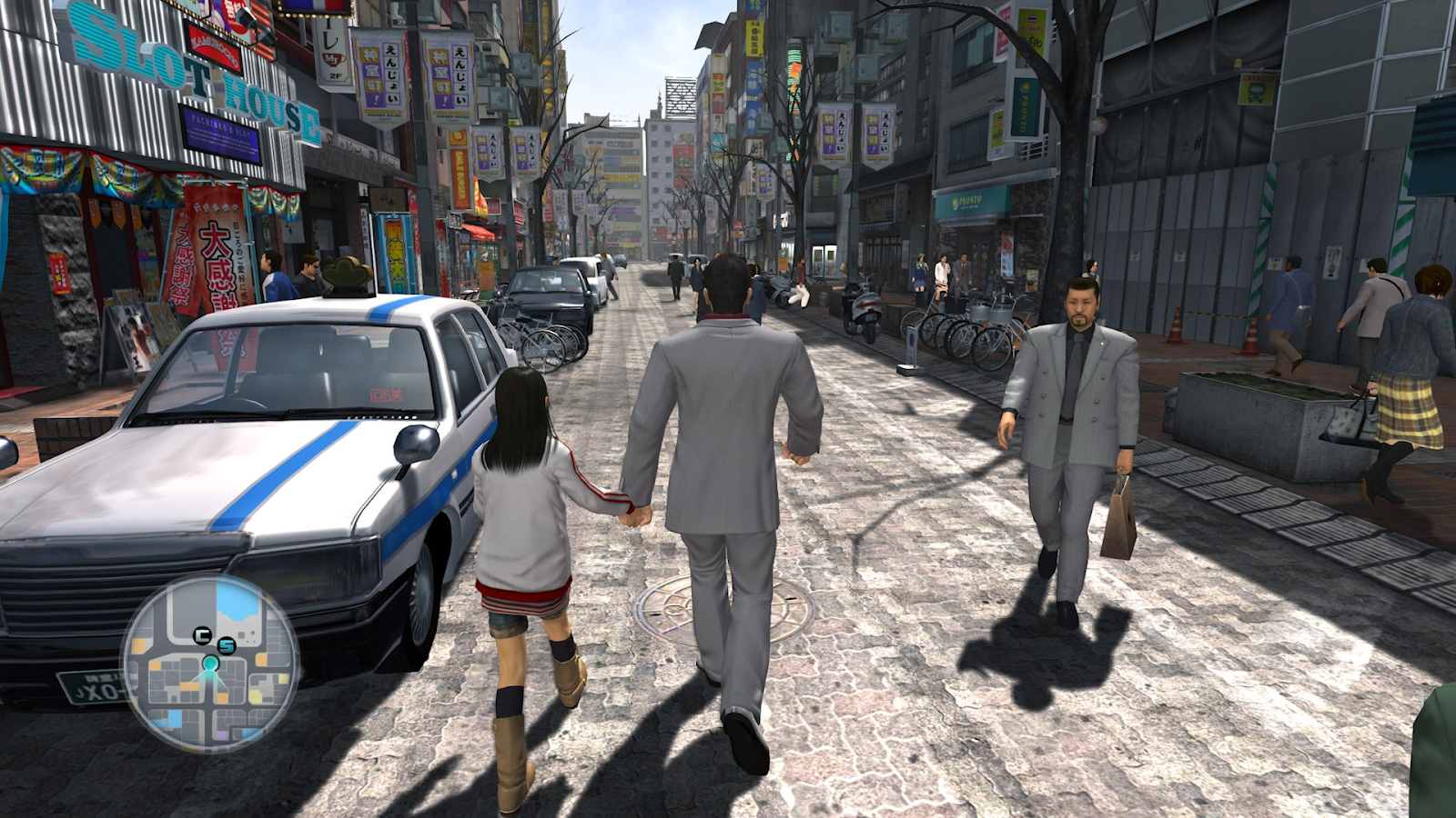 Yakuza 3 walking with a girl through the streets