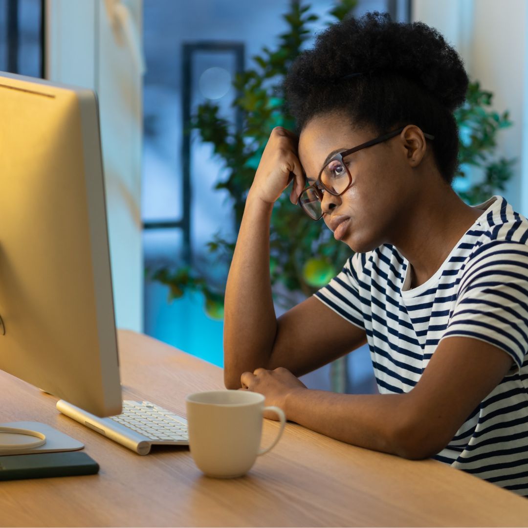 a person sat at a table working from home