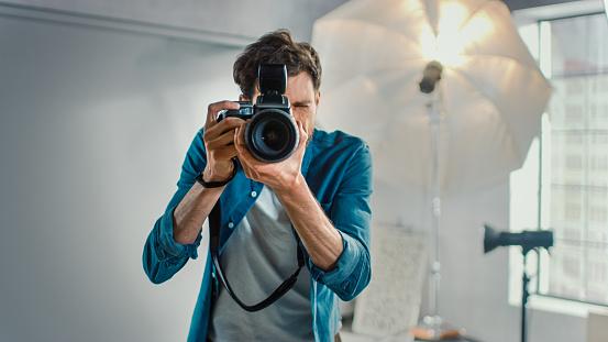 A man holding a camera