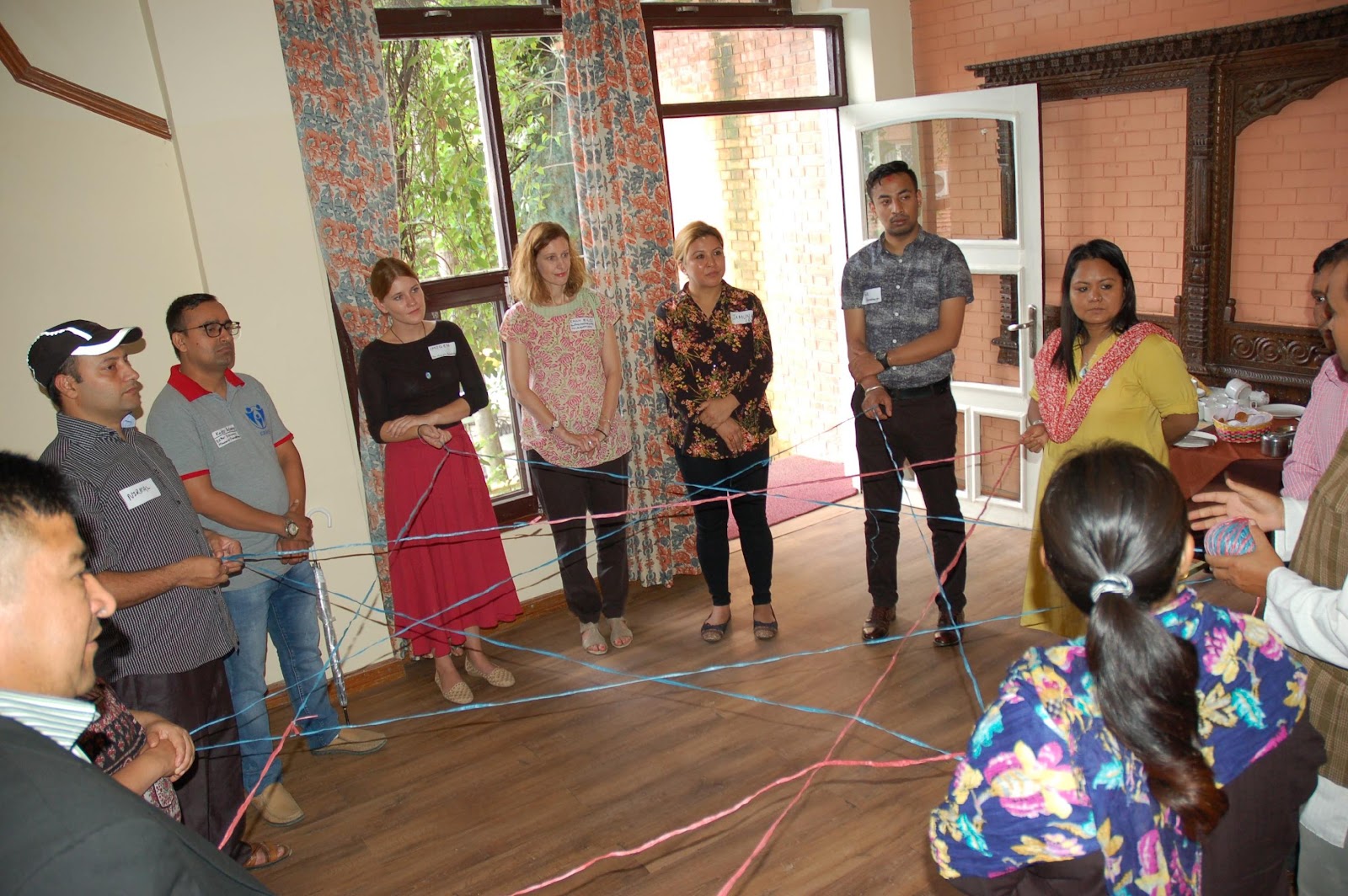 spider web ice breaker to demonstrate the power of collaboration
