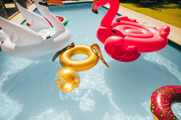 Swimming pool with large extravagant floats