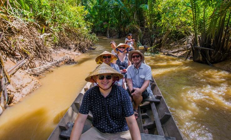 A group of people on a boat</p>
<p>Description automatically generated with medium confidence