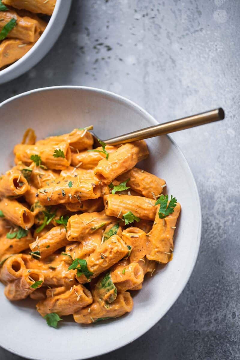 Two bowls of butternut squash pasta