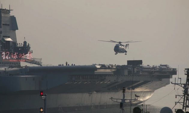 A Z-18 transport helicopter is seen landing on the Chinese aircraft carrier in this photo taken on May 5, 2018. Photo: Global Times