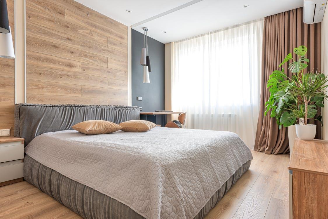 White Bed Linen With Brown Pillows