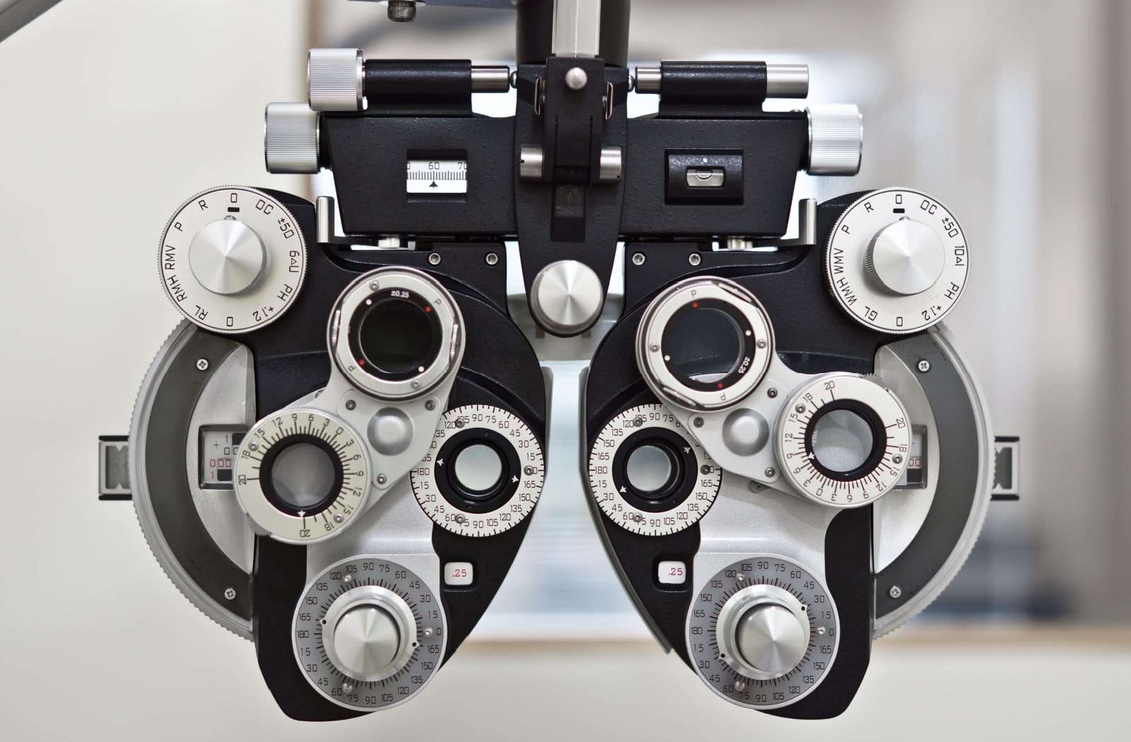 An image of a phoropter, which is used during an eye exam to test different lenses on each eye