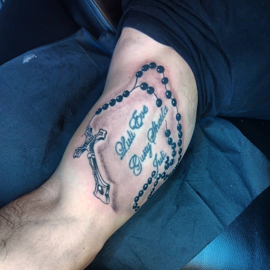 word and rosary tattoo