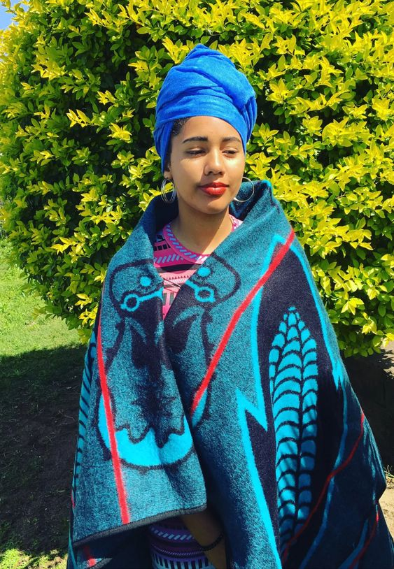 pretty lady wearing Sotho traditional outfit