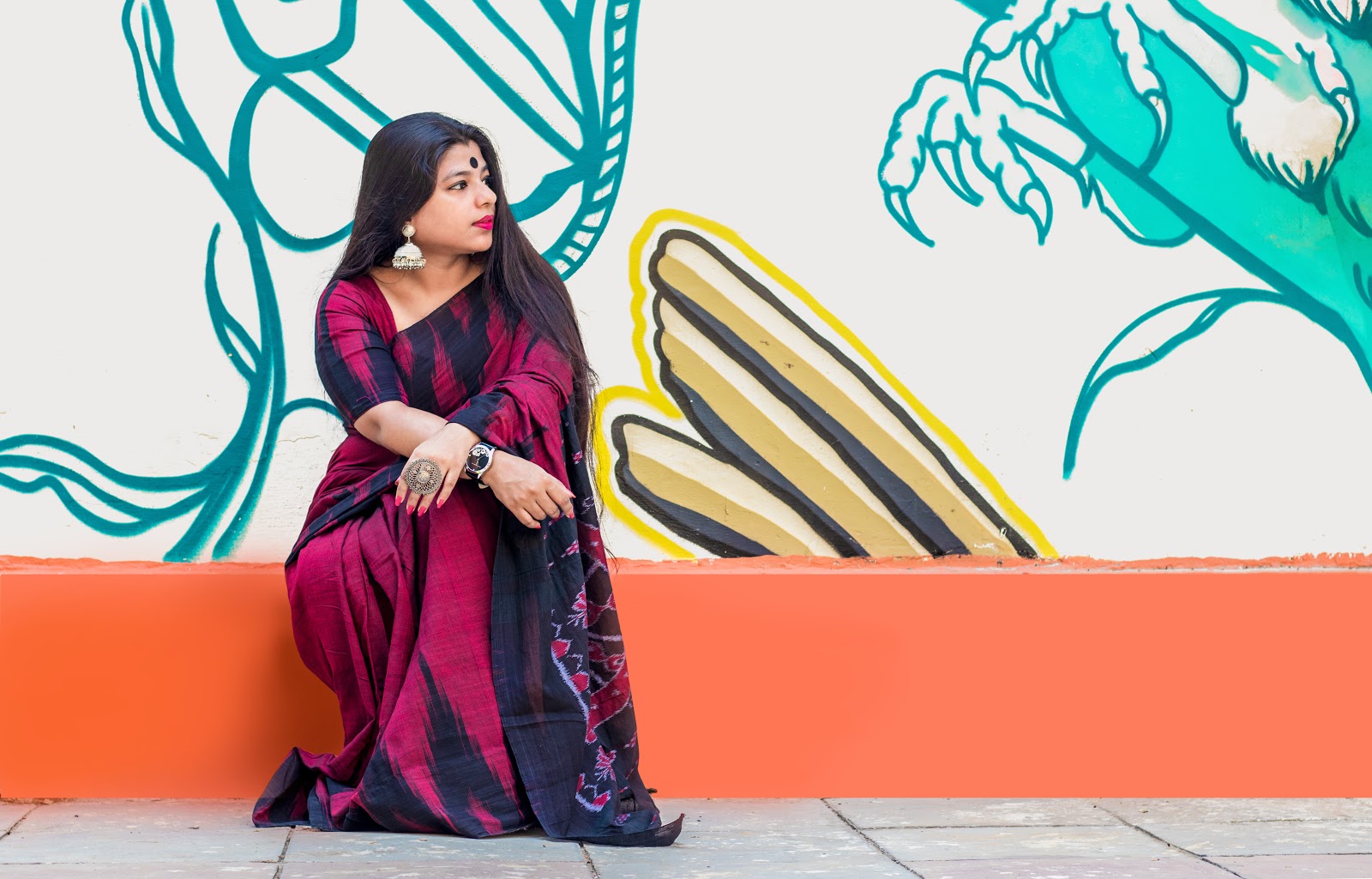 Woman in a saree having photoshoot at Lodhi Art District