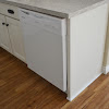 Installing Floating Floor Around Kitchen Cabinets : Installing Cabinet End Panels In Solid Oak Kitchens Solid Wood Kitchen Cabinets Information Guides : The cabinets are 'fixed' so you don't want to install fixed objects over a 'floating' floor.