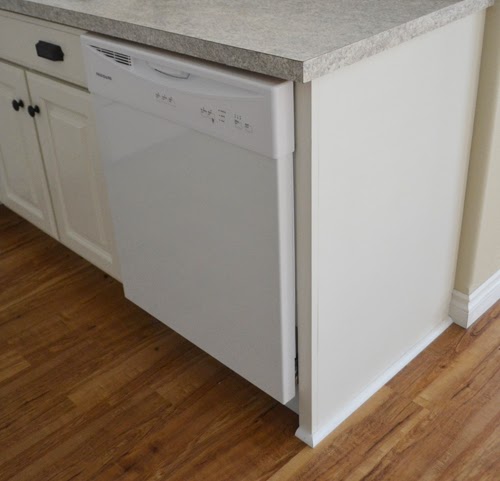 Installing Floating Floor Around Kitchen Cabinets : Installing Cabinet End Panels In Solid Oak Kitchens Solid Wood Kitchen Cabinets Information Guides : The cabinets are 'fixed' so you don't want to install fixed objects over a 'floating' floor.