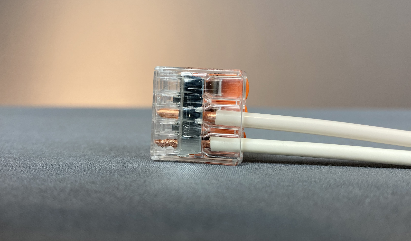 Lever-nuts allow easy, frictionless insertion of both solid (middle) and stranded (bottom) conductors.