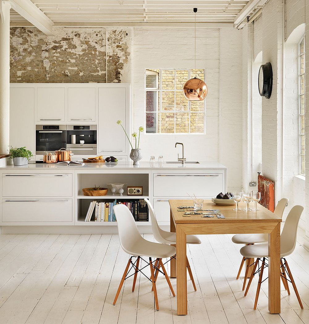 rustic white scandinavian kitchen with distressed brick wall, white wood floors, modern white cabinets, exposed ceilling and whitewashed brick walls