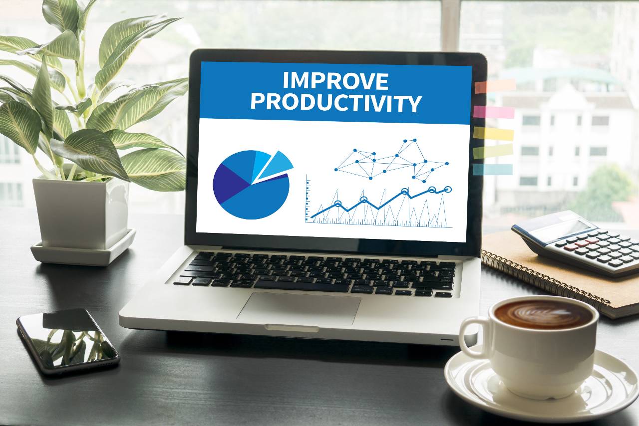 Improve Productivity note on a laptop