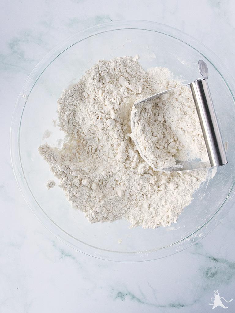 Crumble mixture of butter and flour for pie crust dough
