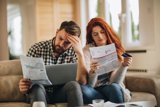 Couple struggles to read utility bills