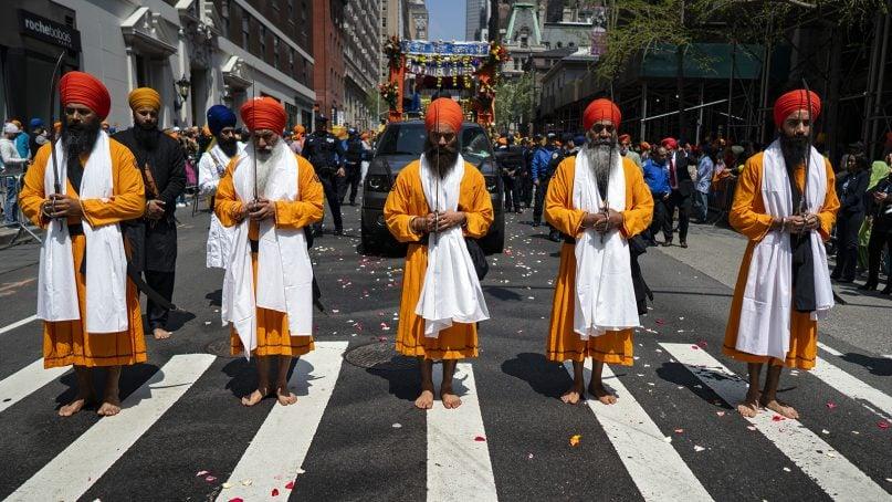 Who are the Sikhs and what are their beliefs?