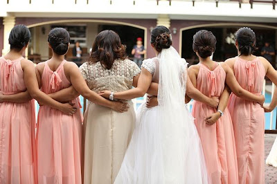 wedding ideas - bridesmaids and bride standing with their backs to the camera - wedding planning - services provided by wedding planners in Philadelphia PA - wedding planners capable - wedding ideas blog by K'Mich