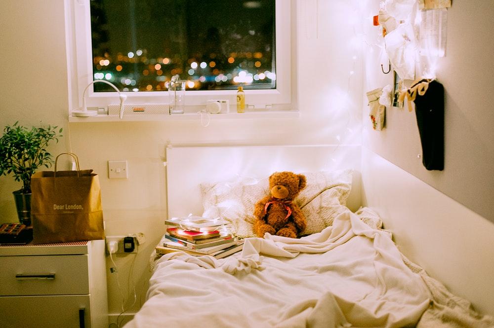 Bed with stuffed animal